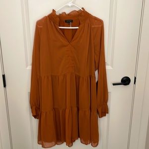 Such a pretty burnt orange babydoll dress
